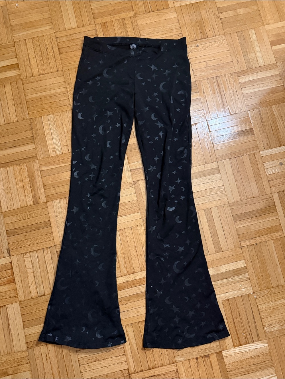 Women’s Black Moon & Star Flared Leggings